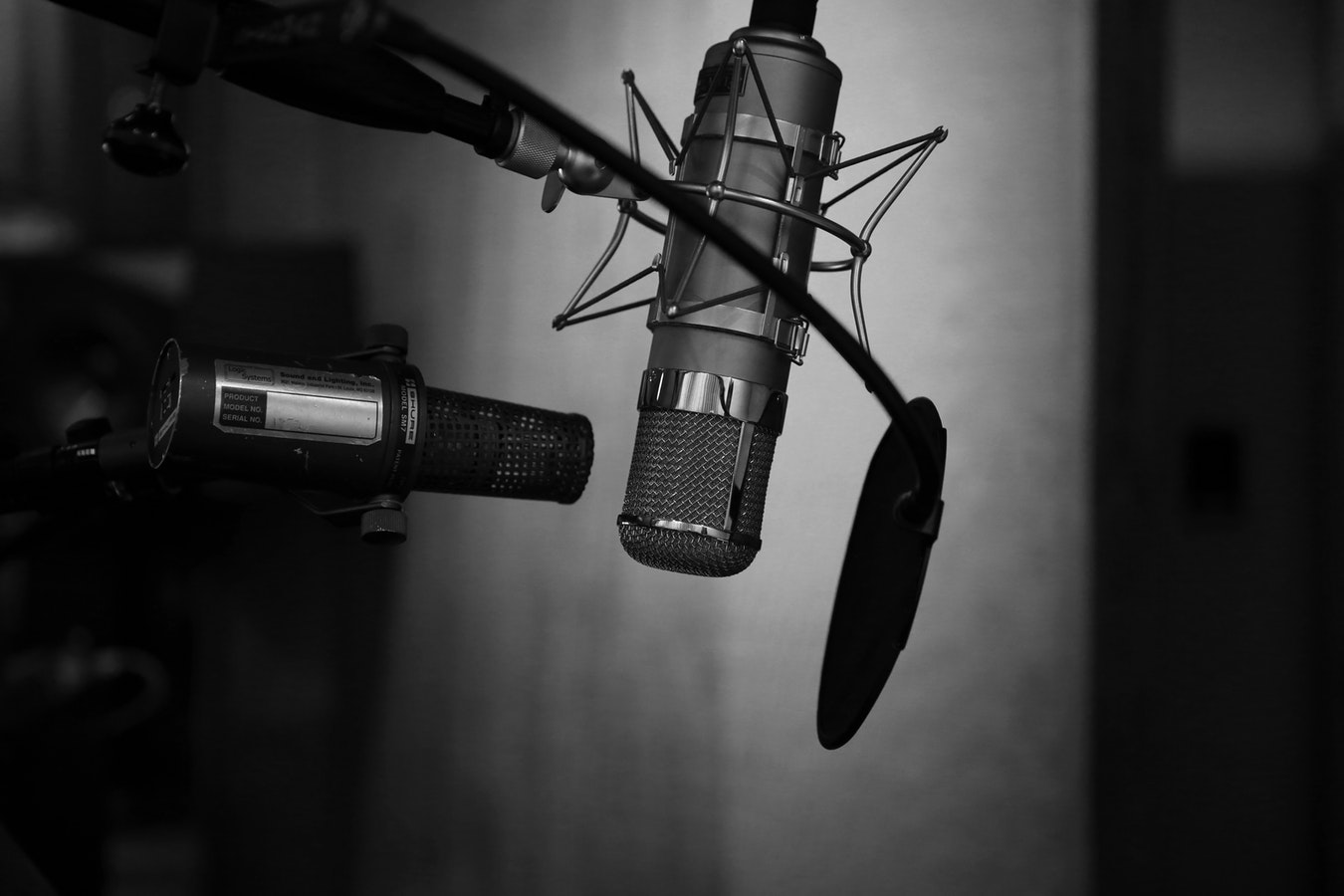 Black and white photo of a recording studio microphone.